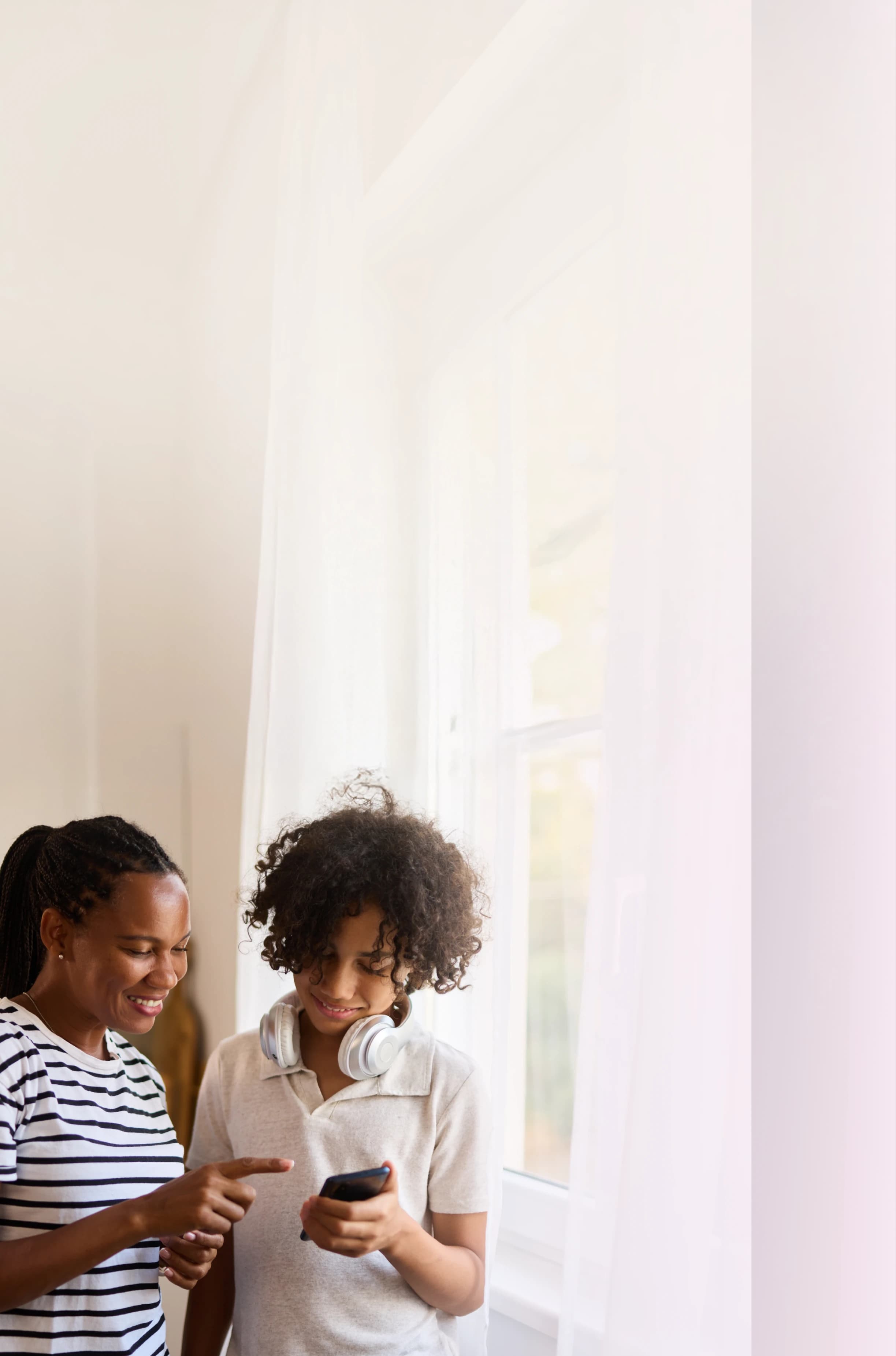 family looking at phone